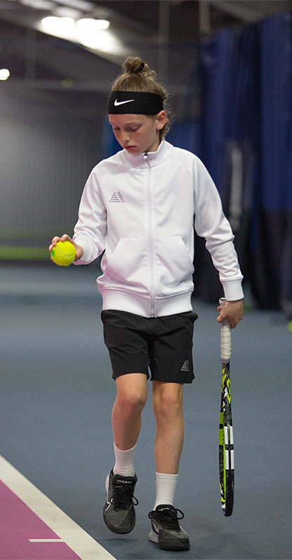 Kid Tennis Player Getting Ready to Serve Kid Tennis Player Getting Ready to Serve